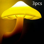 Auto sensor LED mushroom night light plugged into wall socket